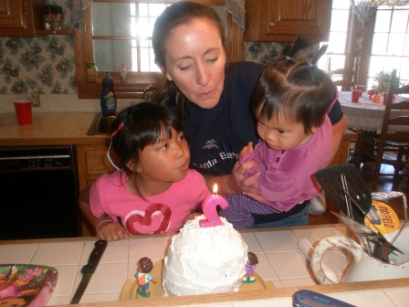 Karis, Kasen and Mommy blowing out candle